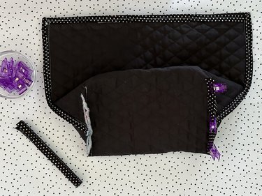 tuck corner edges into seam binding, clip and sew