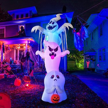 Multi-colored trio of ghosts Halloween inflatable.