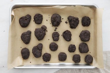 Cactus cake balls on a baking sheet