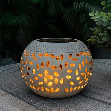 White table lantern with leafy designs