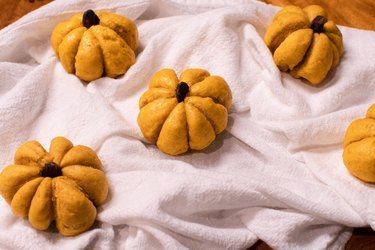 Pumpkin rolls on tablecloth