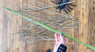 Small sticks for bristles and a thicker stick for broom handle