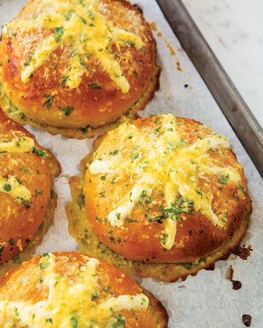 Fresh-from-the-oven garlic buns bubbling with cheesy goodness