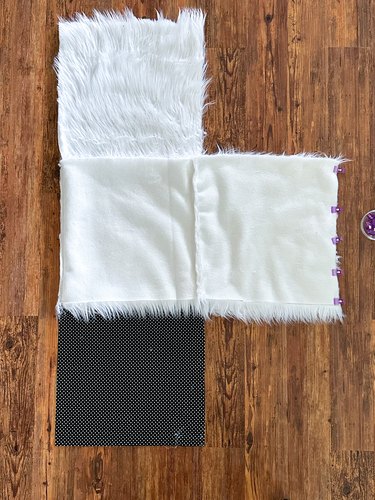 clip and sew faux fur pieces to form a cube