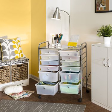 Rolling cart with 12 drawers in a room