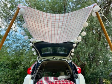 awning attached to car trunk