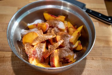 Combine peaches, sugar and spices