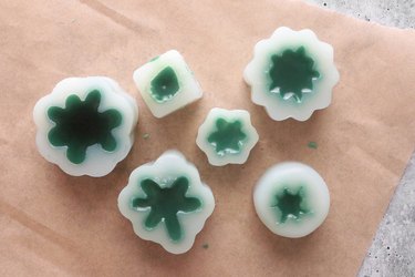 Green candle wax in succulent silicone molds