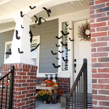 Hanging bats outside front door