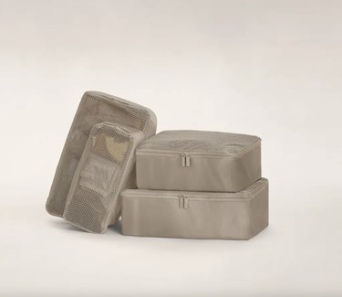 Set of four tan packing cubes