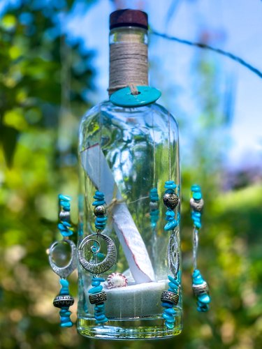 finished message in a bottle wind chimes vertical photo