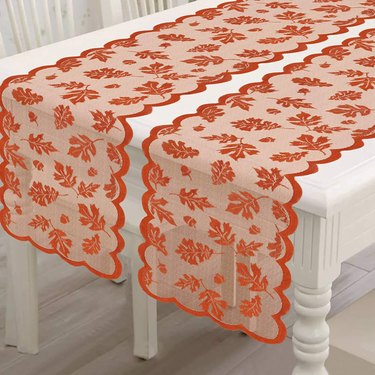 Two lace table runners featuring leaves