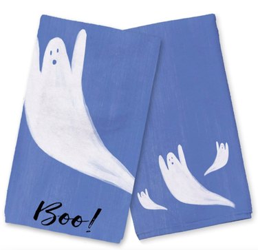 Ghosts Tea Towel Set from Michaels. The towels are blue with handpainted ghosts and the word "Boo!"