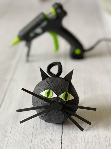 Finished Halloween Cat surprise ball, ready for hanging