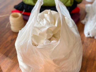 fill plastic grocery bag with an old sheet