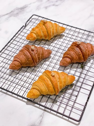 Candles shaped like four croissants