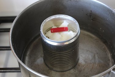 wax melting in can on stove
