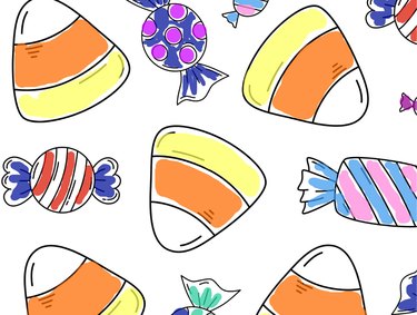 Coloring page featuring filled-in candy corn and hard candy in striped wrappers