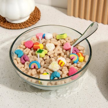 Candle shaped like a bowl of Lucky Charms cereal