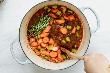 added wine, broth, and rosemary.