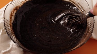Chocolate cake batter in a mixing bowl