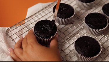 Using a knife to core cupcakes