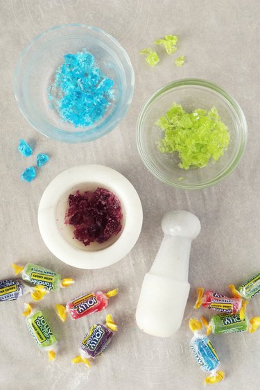 Crushing Jolly Ranchers with a mortar and pestle