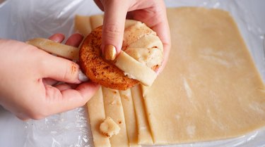 wrapping apple slices in pie crust