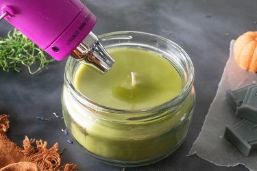 Melting top of candle with heat gun