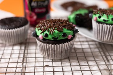 Frankenstein cupcakes on a wire baking tray