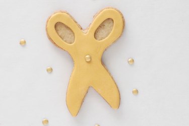 Add gold sequin to center of cookie
