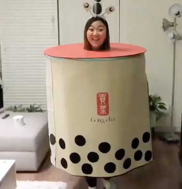 Woman dressed up as a cup of boba tea