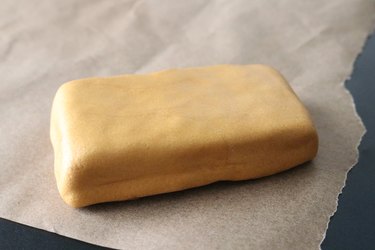 Sugar cookies wrapped in gold fondant