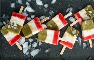 Beautiful red, white and green paletas all lined up