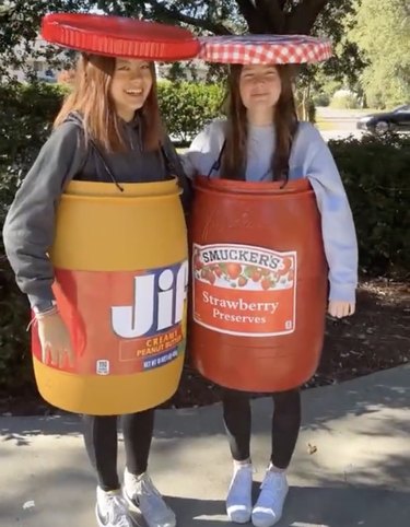 Two women dressed up as peanut butter and jelly containers