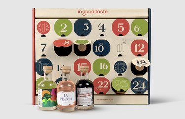 Wine advent calendar, three bottles outside of calendar