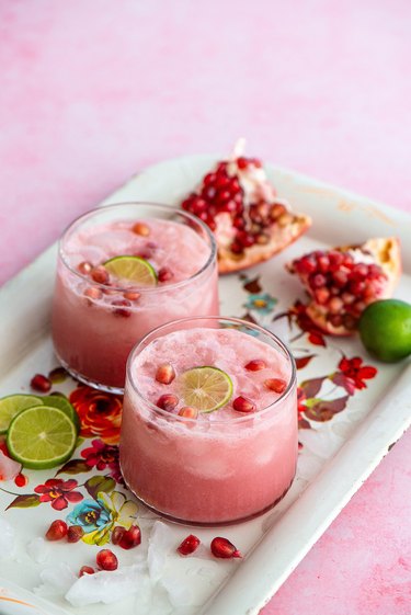 Two cups of pink pomegranate limeade