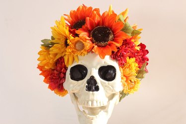 Skull with floral crown.