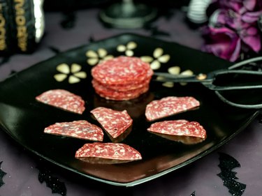 several pieces of salami cut in half