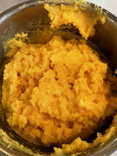 Thick yellow custard filling in a saucepan