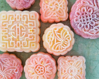 Pastel mooncakes in beautiful pink hues lined up