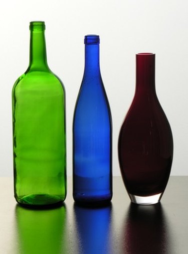 Three Decorative Glass Sealed Bottles Different Shapes Colorful