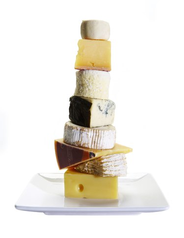 Cheese stacked on white background