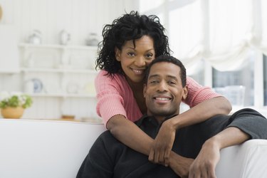 Affectionate couple at home together