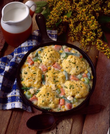 Southern chicken vegetables and dumplings in skillet