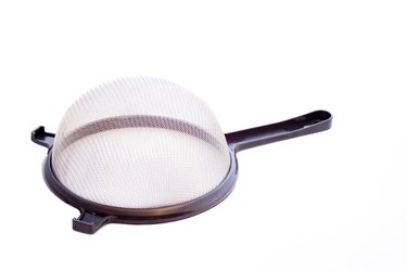 Small Black Strainer Isolated on White Background