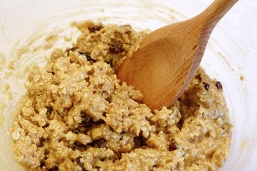 Mixing oatmeal raisin cookie dough