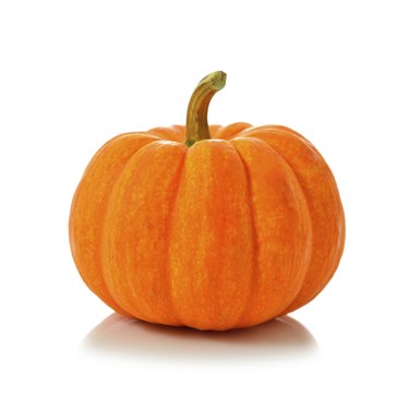 Fresh orange pumpkin isolated on white background