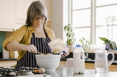 Woman cooking in kitchen