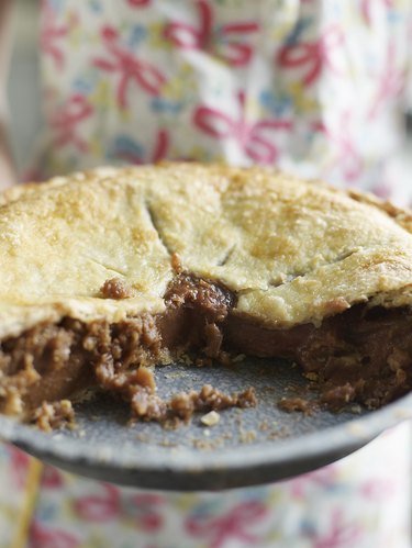 Woman Holding Rhubarb Pie